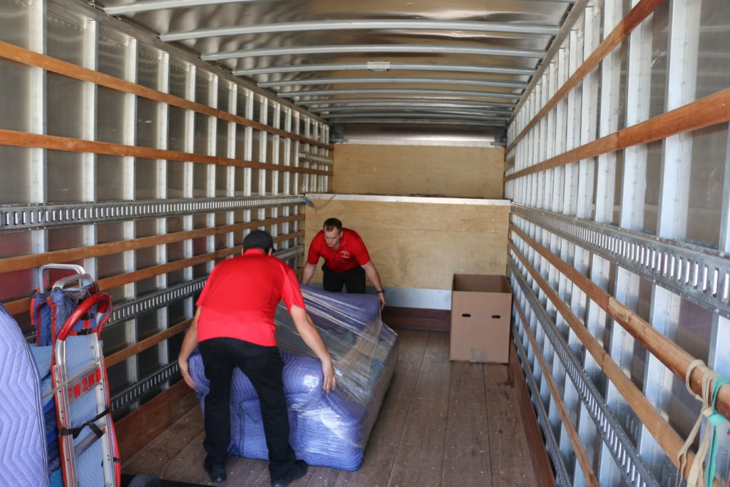 Firefighting's Finest Moving & Storage employees performing moving services in Austin, Texas
