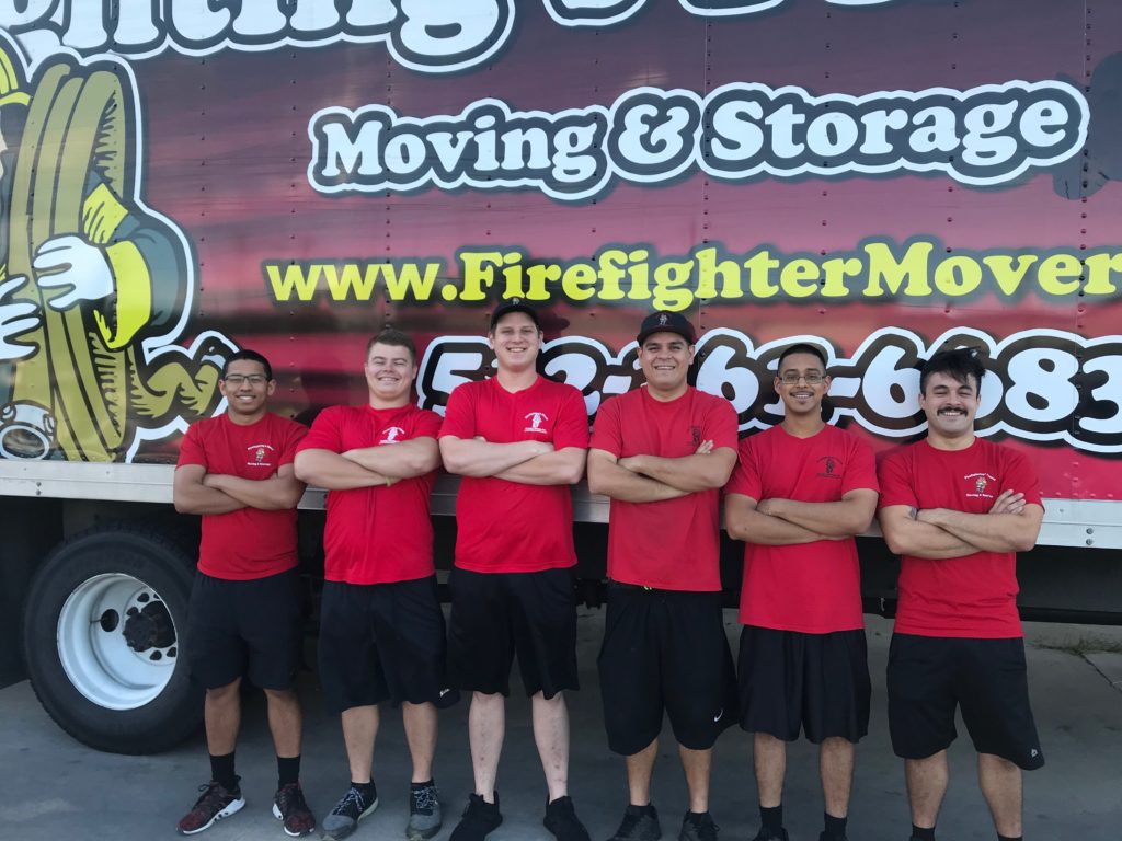 austin moving team lined up in front of moving truck