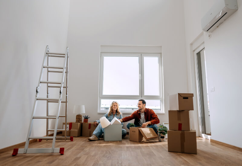 A couple unpacking in an apartment in Austin, Texas