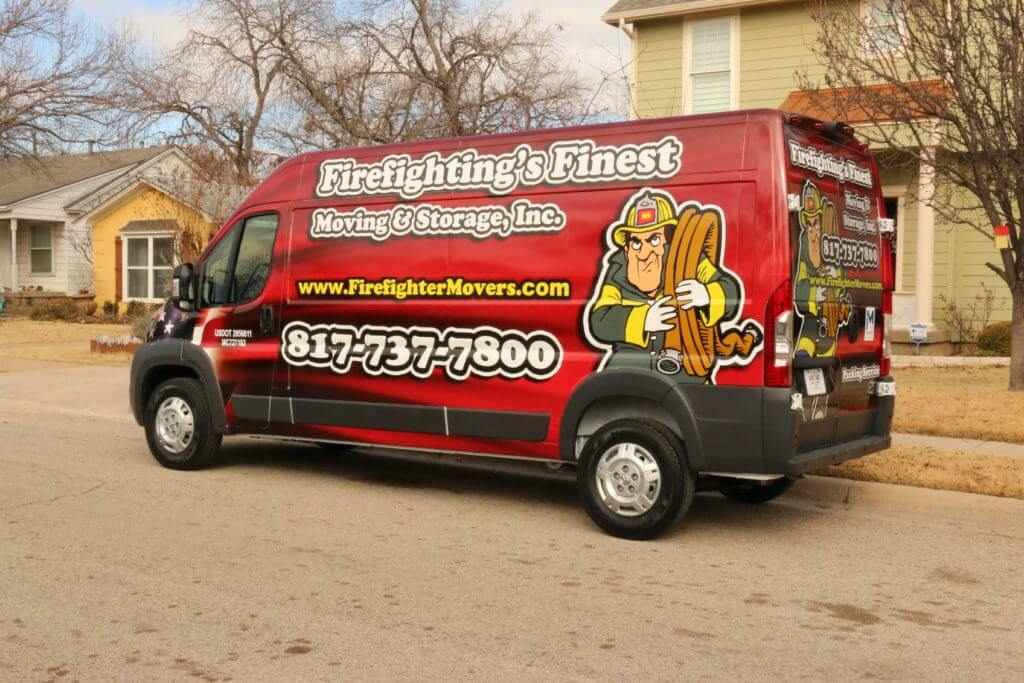 Van of Firefighting's Finest Moving & Storage parked near warehouse in Conroe, TX