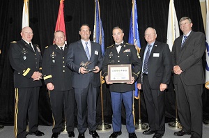 military personnel accepting award from Firefighting's Finest