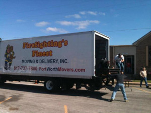 Firefighting Moving & Storage Truck Donating Foods & Aids for People in Texas
