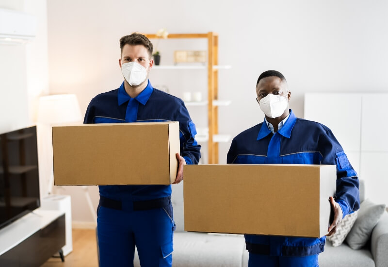 Employees performing moving services in Texas