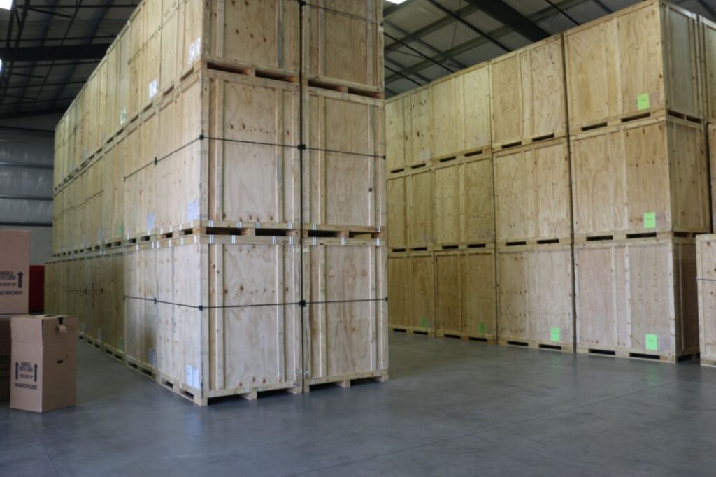 warehouse full of wooden boxes for secure storage of possessions