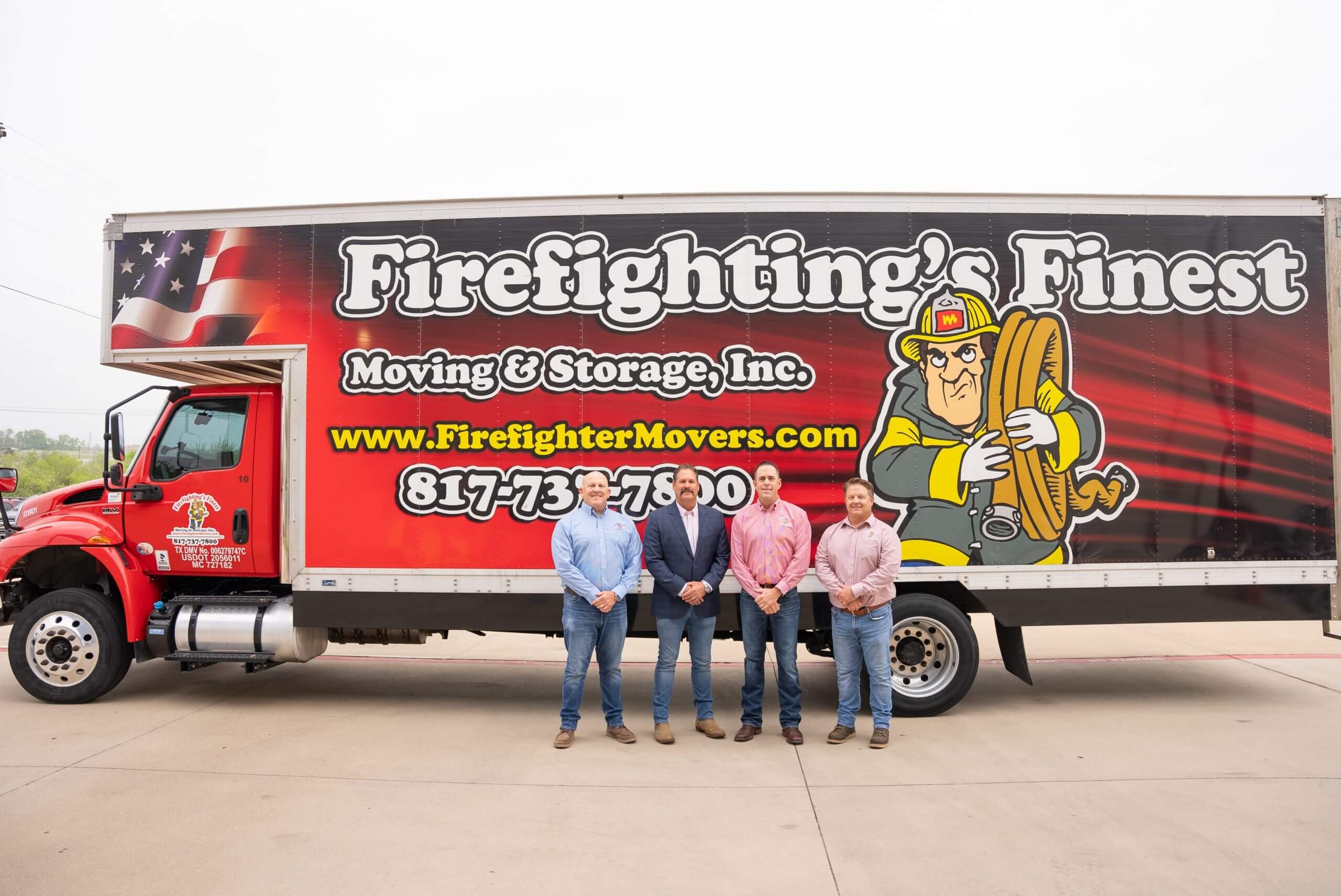 Firefighting's Finest Moving and Storage employees in front of a moving truck in Texas