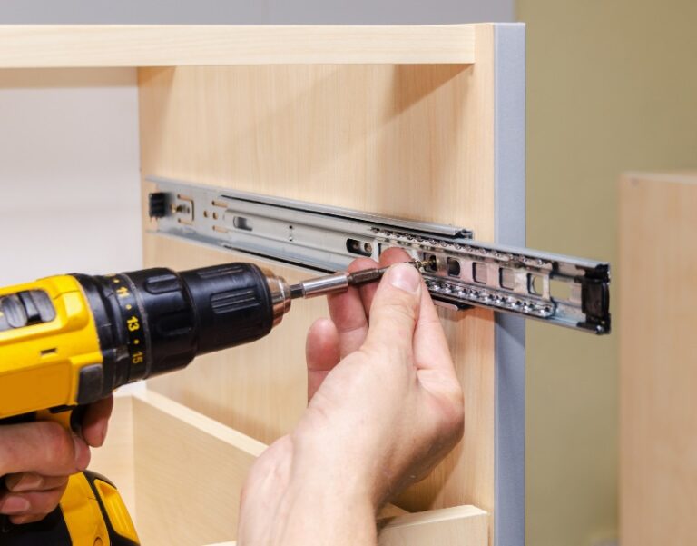 A team member performing furniture reassembly services in Fort Worth, Dallas, Houston, and Austin, Texas
